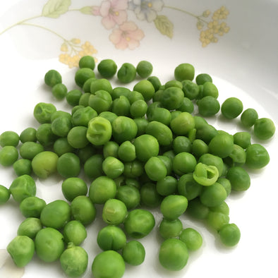 Pincer grip baby led weaning baby uses pincer grip to eat peas
